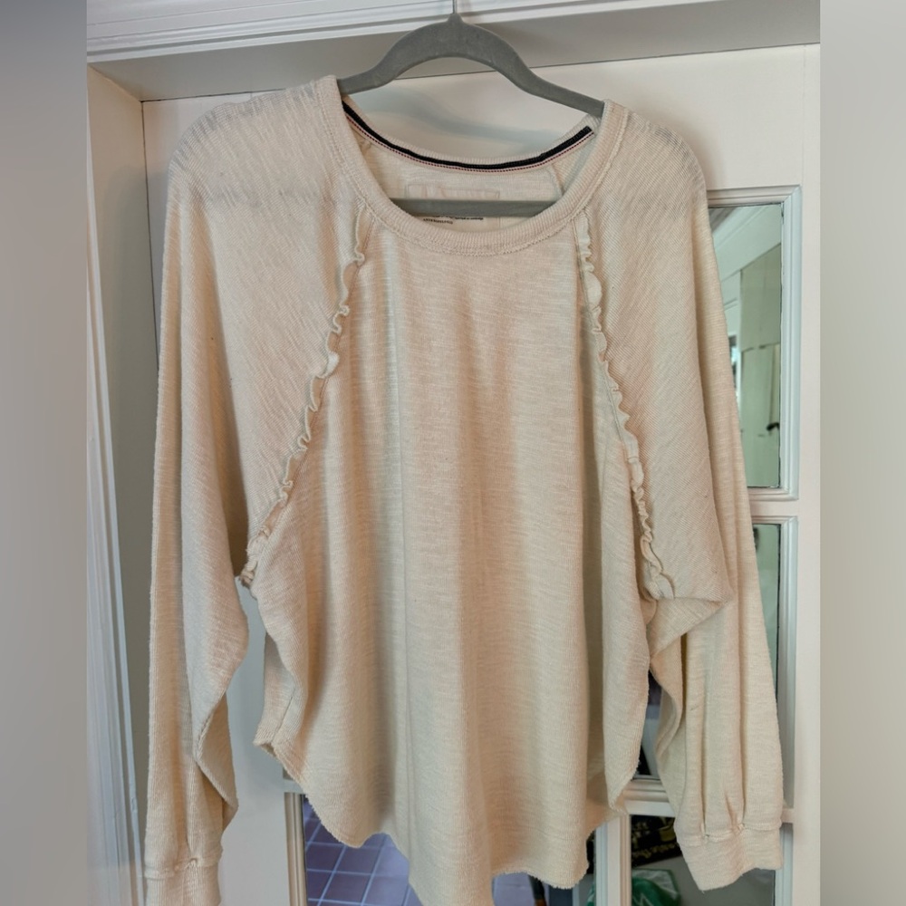 Anthropology brand women’s cream top